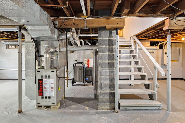 236 Jeffrey St NE, Cedar Springs, MI 49319 - unfinished below grade area featuring stairs and heating unit