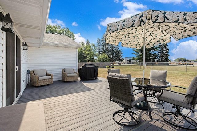 236 Jeffrey St NE, Cedar Springs, MI 49319 - deck with grilling area and a fenced backyard