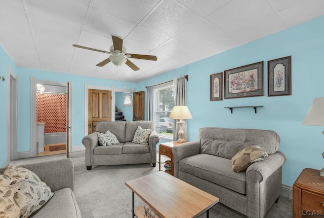 318 E Adrian St, Blissfield, MI 49228 - carpeted living room with ceiling fan