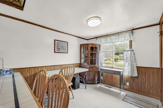 318 E Adrian St, Blissfield, MI 49228 - carpeted home office with wood walls, wainscoting, and ornamental molding