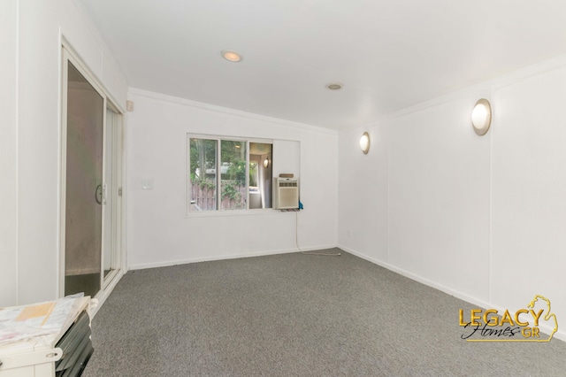 445 Prince St SE, Grand Rapids, MI 49507 - carpeted empty room with cooling unit and crown molding