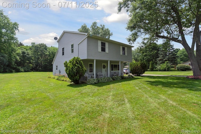 5045 Pine Knob Trl, Clarkston, MI 48346 - view of front facade with a front yard and covered porch