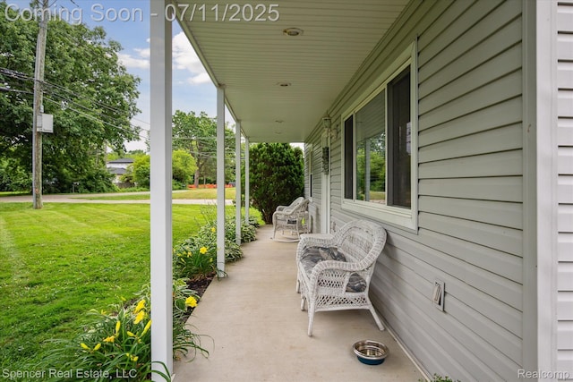 5045 Pine Knob Trl, Clarkston, MI 48346 - covered porch with a lawn