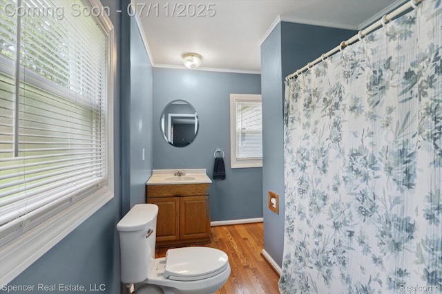 5045 Pine Knob Trl, Clarkston, MI 48346 - full bathroom with crown molding, vanity, wood finished floors, and a shower with shower curtain