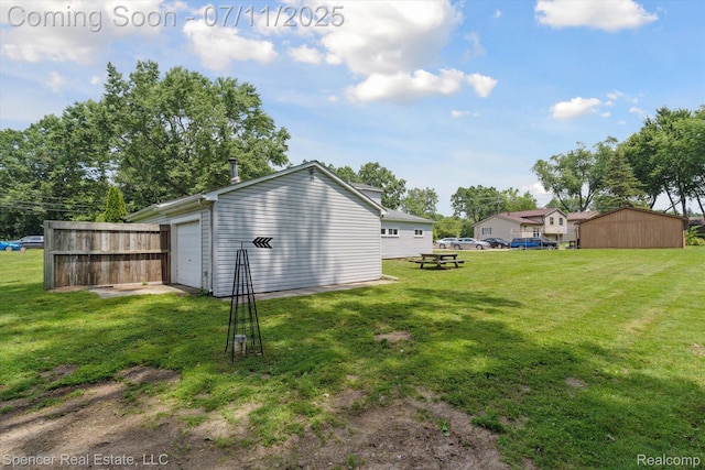 5045 Pine Knob Trl, Clarkston, MI 48346 - view of green lawn featuring an outdoor structure