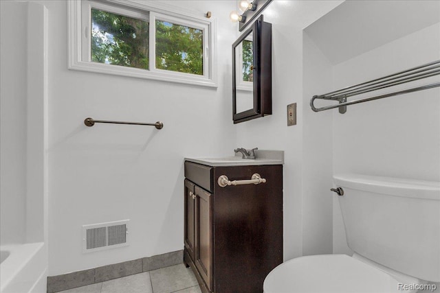 4800 Bishop St, Detroit, MI 48224 - bathroom with vanity, tile patterned flooring, and a tub
