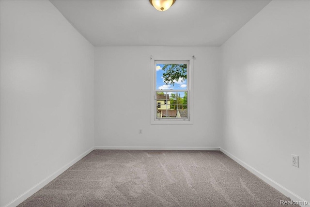4800 Bishop St, Detroit, MI 48224 - spare room featuring carpet and baseboards
