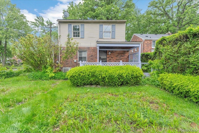 4800 Bishop St, Detroit, MI 48224 - view of front of home featuring brick siding and a porch