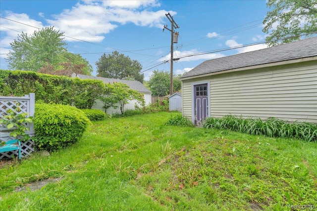 4800 Bishop St, Detroit, MI 48224 - view of yard featuring a shed