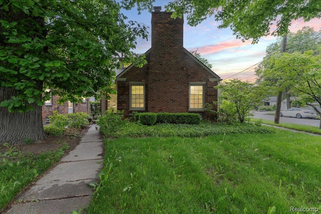 4800 Bishop St, Detroit, MI 48224 - view of front of property with a chimney and brick siding