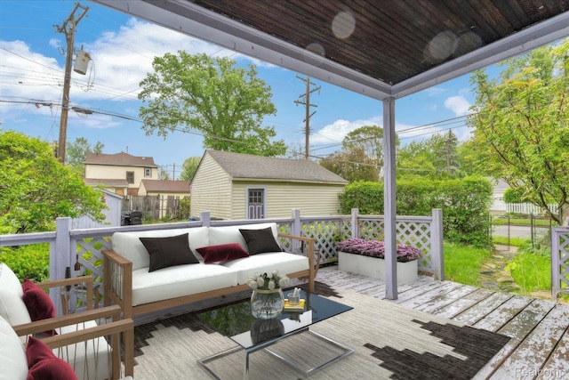 4800 Bishop St, Detroit, MI 48224 - wooden terrace featuring outdoor lounge area and a storage shed