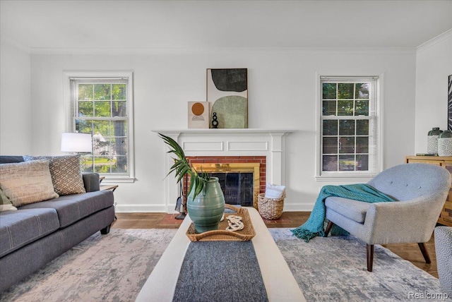 4800 Bishop St, Detroit, MI 48224 - living room featuring wood finished floors, ornamental molding, and a brick fireplace