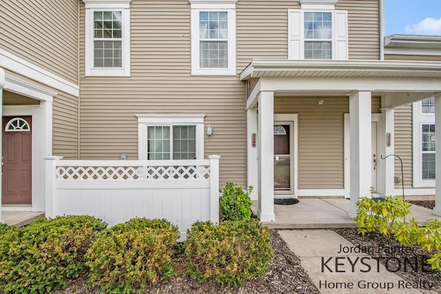 3508 River Run St, Wyoming, MI 49418 - doorway to property featuring covered porch