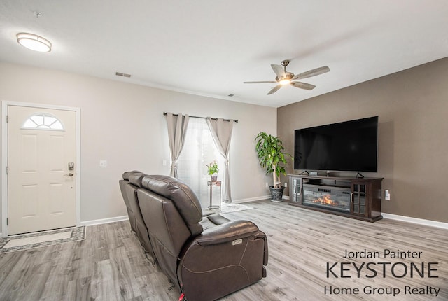 3508 River Run St, Wyoming, MI 49418 - living area with wood finished floors and a ceiling fan
