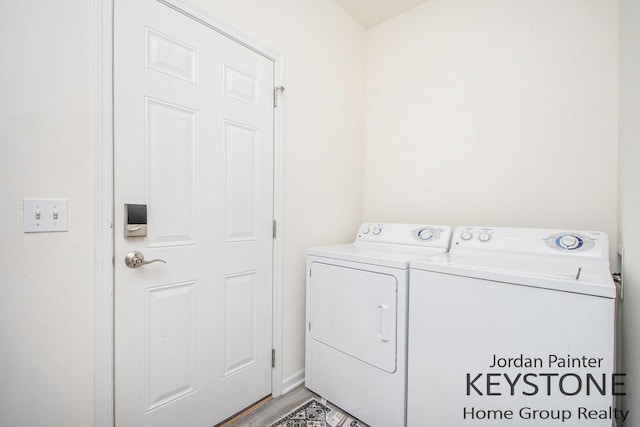 3508 River Run St, Wyoming, MI 49418 - washroom featuring washing machine and dryer and light wood-style flooring