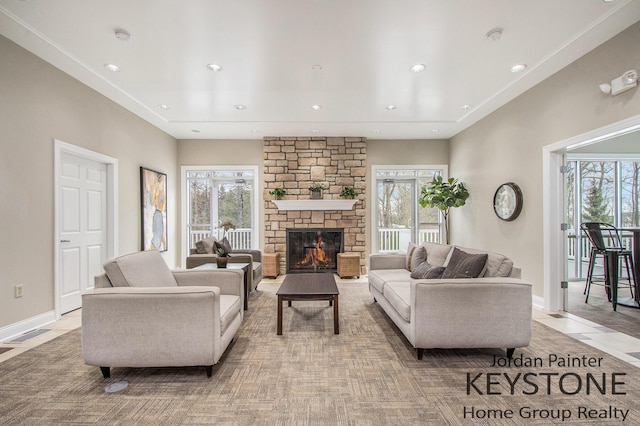 3508 River Run St, Wyoming, MI 49418 - living room featuring healthy amount of natural light, recessed lighting, and a fireplace
