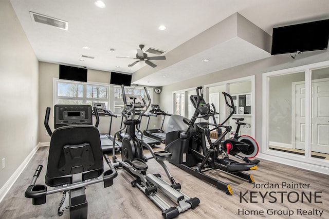 3508 River Run St, Wyoming, MI 49418 - gym featuring wood finished floors, plenty of natural light, a ceiling fan, and recessed lighting