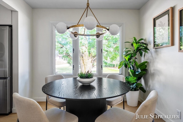 751 Old Gate Rd NW, Grand Rapids, MI 49504 - dining space featuring baseboards and light wood finished floors
