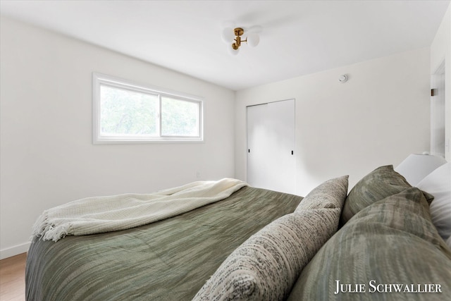 751 Old Gate Rd NW, Grand Rapids, MI 49504 - bedroom with wood finished floors and baseboards