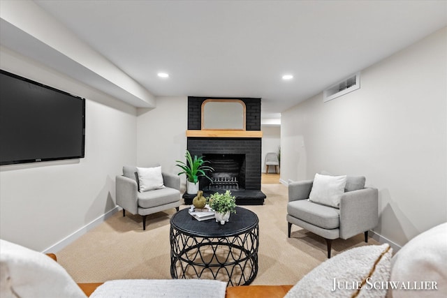 751 Old Gate Rd NW, Grand Rapids, MI 49504 - living room with a brick fireplace, recessed lighting, and carpet flooring