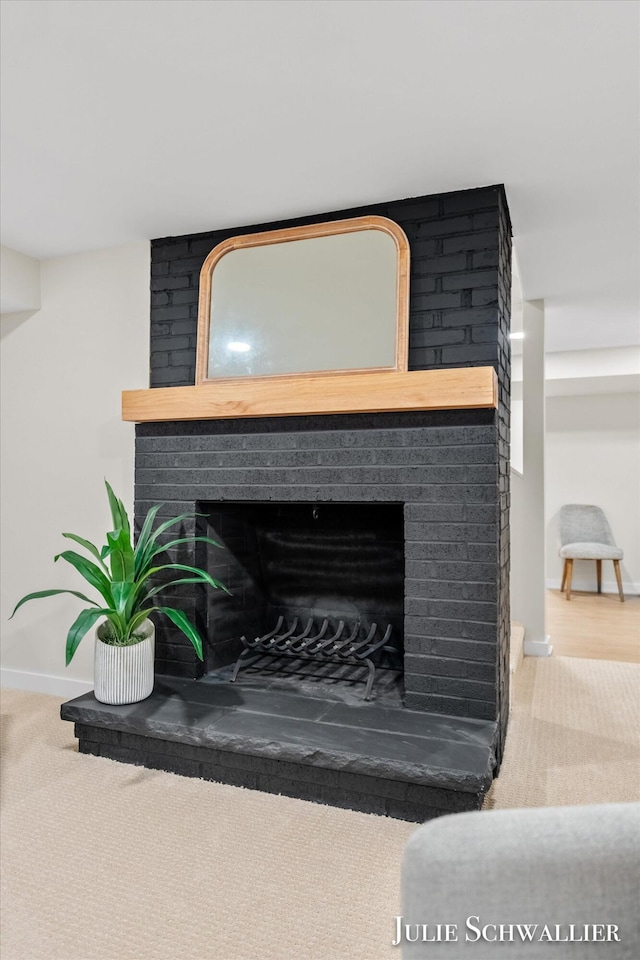 751 Old Gate Rd NW, Grand Rapids, MI 49504 - detailed view of a fireplace and carpet flooring