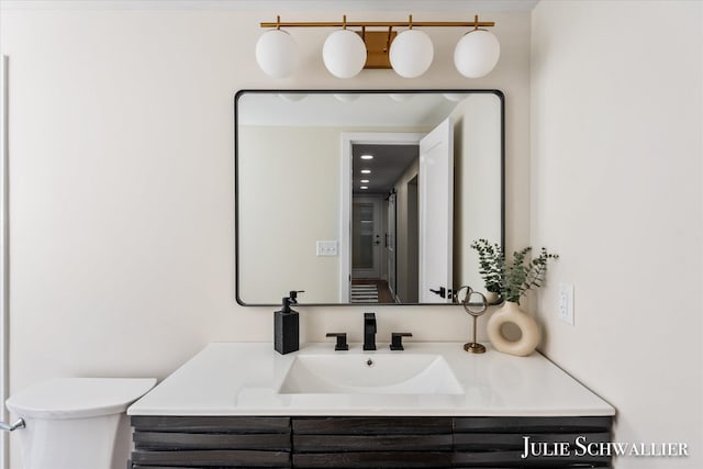 751 Old Gate Rd NW, Grand Rapids, MI 49504 - bathroom with vanity and toilet
