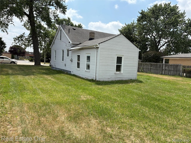 5873 Elmgrove Ave, Warren, MI 48092 - rear view of property with roof with shingles