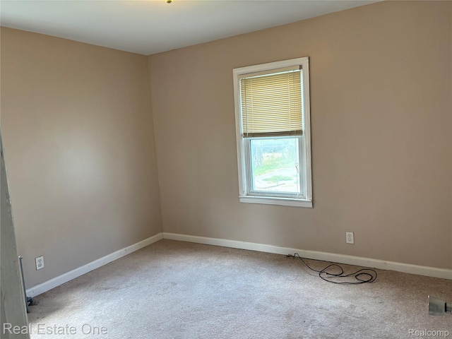 5873 Elmgrove Ave, Warren, MI 48092 - carpeted empty room featuring baseboards