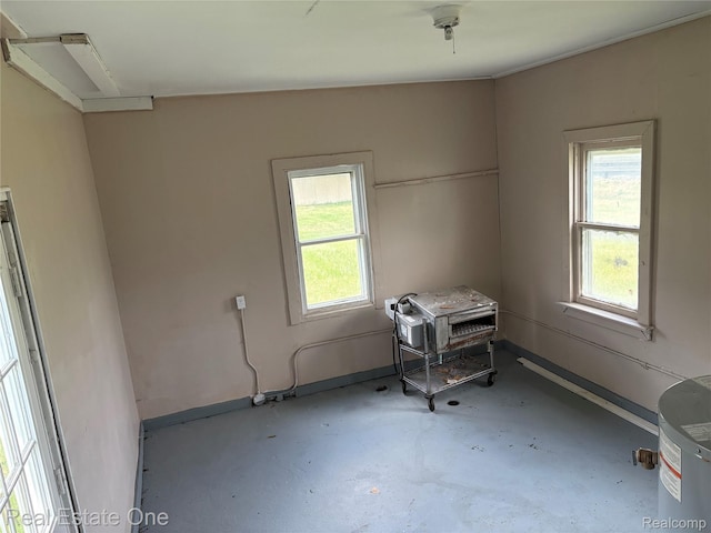 5873 Elmgrove Ave, Warren, MI 48092 - unfurnished room with plenty of natural light and concrete flooring