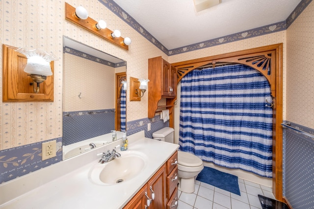 616 N Lincoln Ave, Lakeview, MI 48850 - bathroom with wallpapered walls, tile patterned floors, vanity, and a shower with curtain