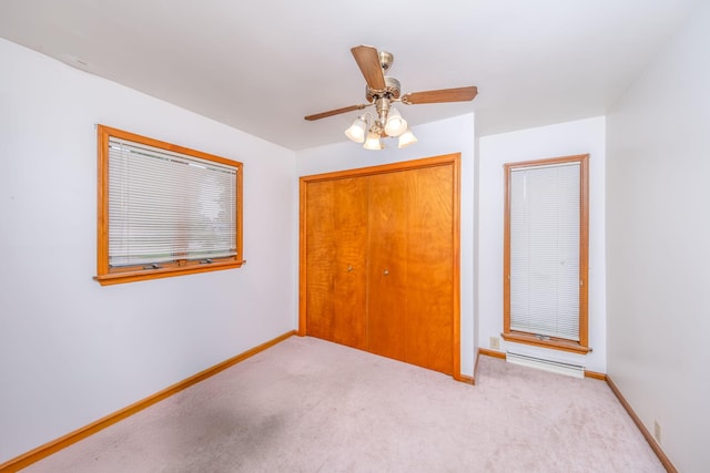 616 N Lincoln Ave, Lakeview, MI 48850 - unfurnished bedroom featuring a closet, carpet, and ceiling fan