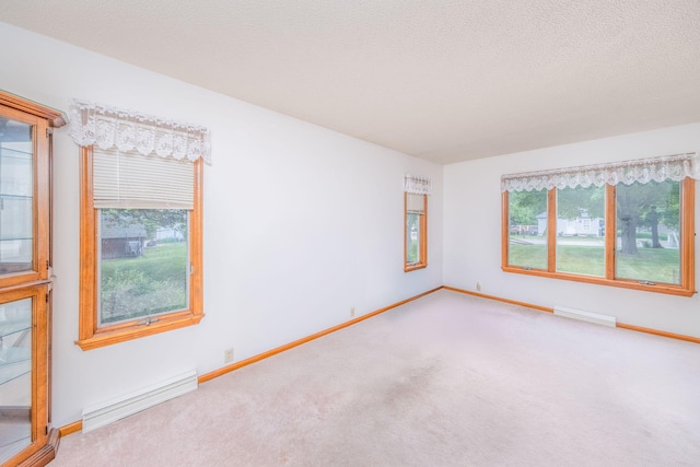616 N Lincoln Ave, Lakeview, MI 48850 - carpeted spare room with a baseboard radiator and baseboards
