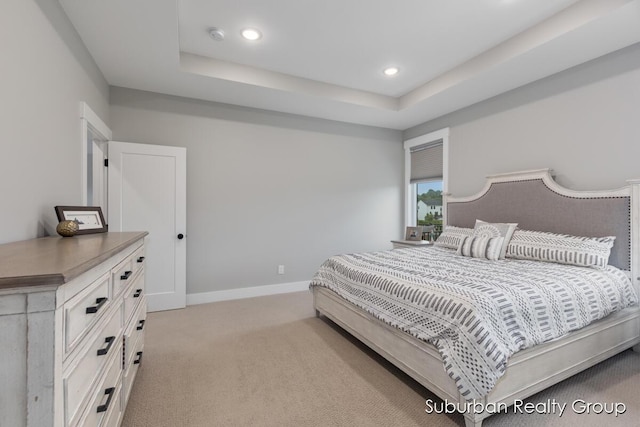 8056 Tramway Dr SW, Byron Center, MI 49315 - bedroom featuring light carpet, recessed lighting, and a raised ceiling