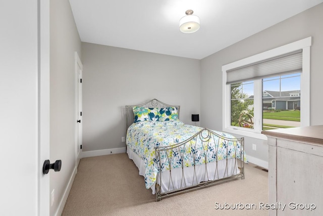 8056 Tramway Dr SW, Byron Center, MI 49315 - carpeted bedroom with baseboards