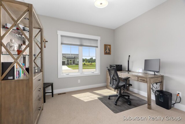 8056 Tramway Dr SW, Byron Center, MI 49315 - office area featuring carpet floors and baseboards