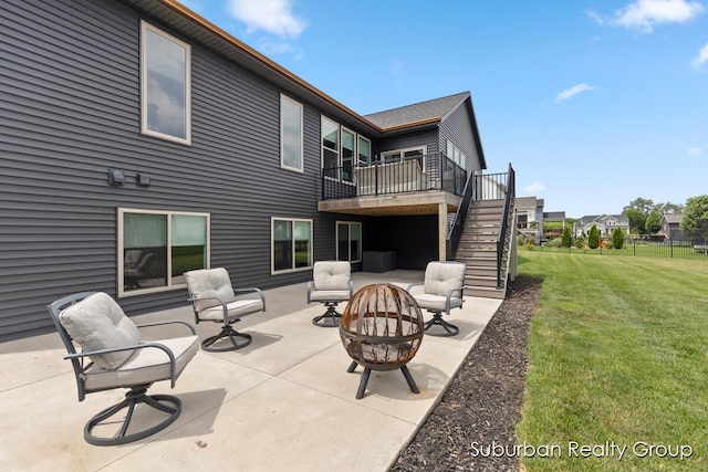 8056 Tramway Dr SW, Byron Center, MI 49315 - view of patio / terrace with an outdoor fire pit, stairs, and a wooden deck