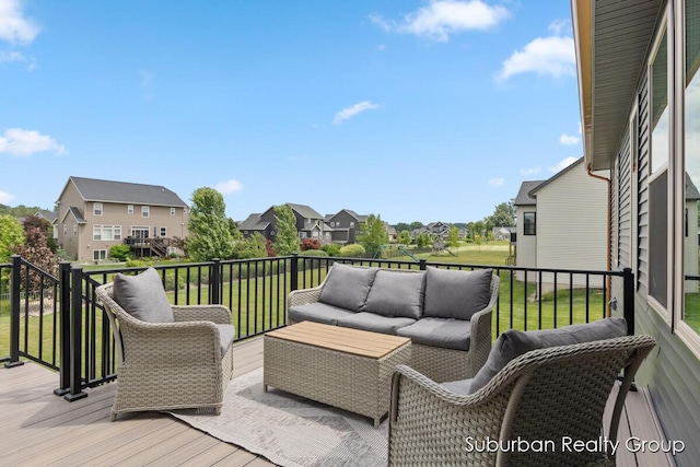 8056 Tramway Dr SW, Byron Center, MI 49315 - wooden deck featuring a residential view, an outdoor hangout area, and a yard