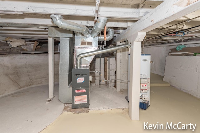 214 Bradford St NE, Grand Rapids, MI 49503 - unfinished below grade area featuring water heater and heating unit