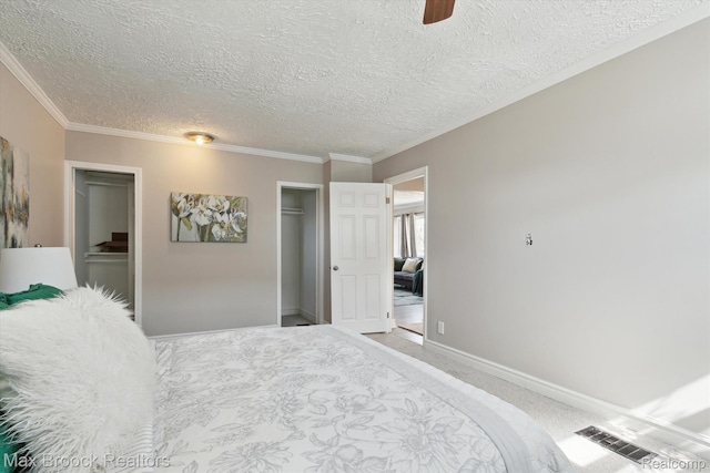 147 Euclid St, Mount Clemens, MI 48043 - carpeted bedroom featuring a textured ceiling, crown molding, and ceiling fan