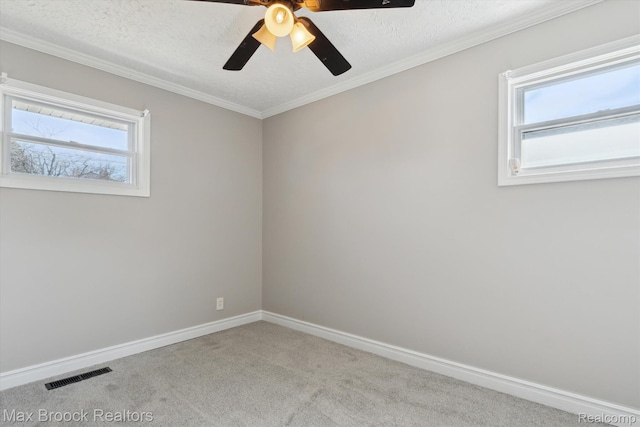 147 Euclid St, Mount Clemens, MI 48043 - carpeted empty room featuring plenty of natural light, a ceiling fan, a textured ceiling, and crown molding