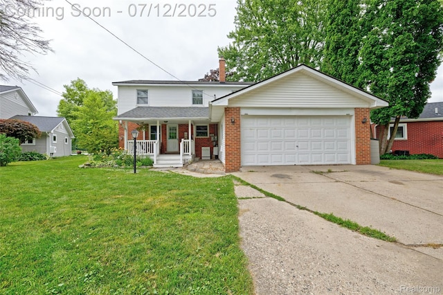1962 Lake Pointe Dr, Ortonville, MI 48462 - traditional-style home featuring brick siding, a porch, concrete driveway, and a front yard
