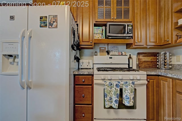 1962 Lake Pointe Dr, Ortonville, MI 48462 - kitchen featuring white appliances, open shelves, brown cabinets, and glass insert cabinets