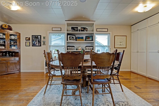 1962 Lake Pointe Dr, Ortonville, MI 48462 - dining area with light wood finished floors and baseboards