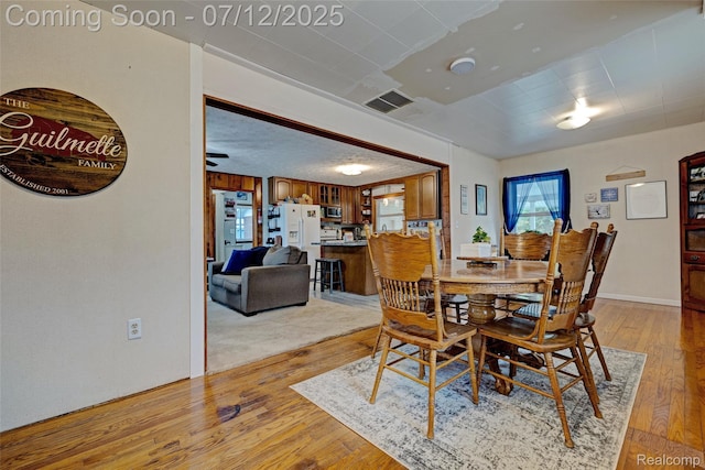 1962 Lake Pointe Dr, Ortonville, MI 48462 - dining room with light wood-type flooring