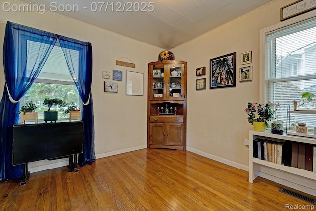 1962 Lake Pointe Dr, Ortonville, MI 48462 - dining room featuring wood finished floors and baseboards