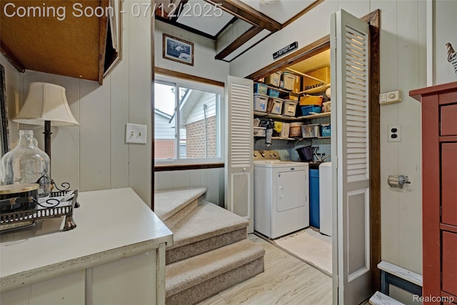 1962 Lake Pointe Dr, Ortonville, MI 48462 - laundry room featuring light wood-style floors and washer and dryer