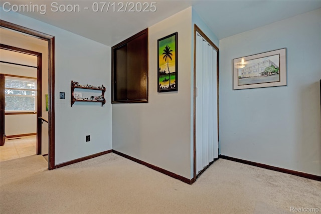 1962 Lake Pointe Dr, Ortonville, MI 48462 - corridor featuring light carpet and baseboards