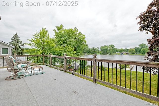 1962 Lake Pointe Dr, Ortonville, MI 48462 - view of patio / terrace with a water view