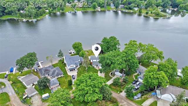 1962 Lake Pointe Dr, Ortonville, MI 48462 - aerial overview of property's location with nearby suburban area and a nearby body of water