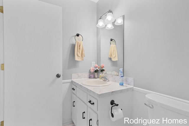 2106 Cranbrook Dr NE, Grand Rapids, MI 49505 - bathroom with toilet and vanity